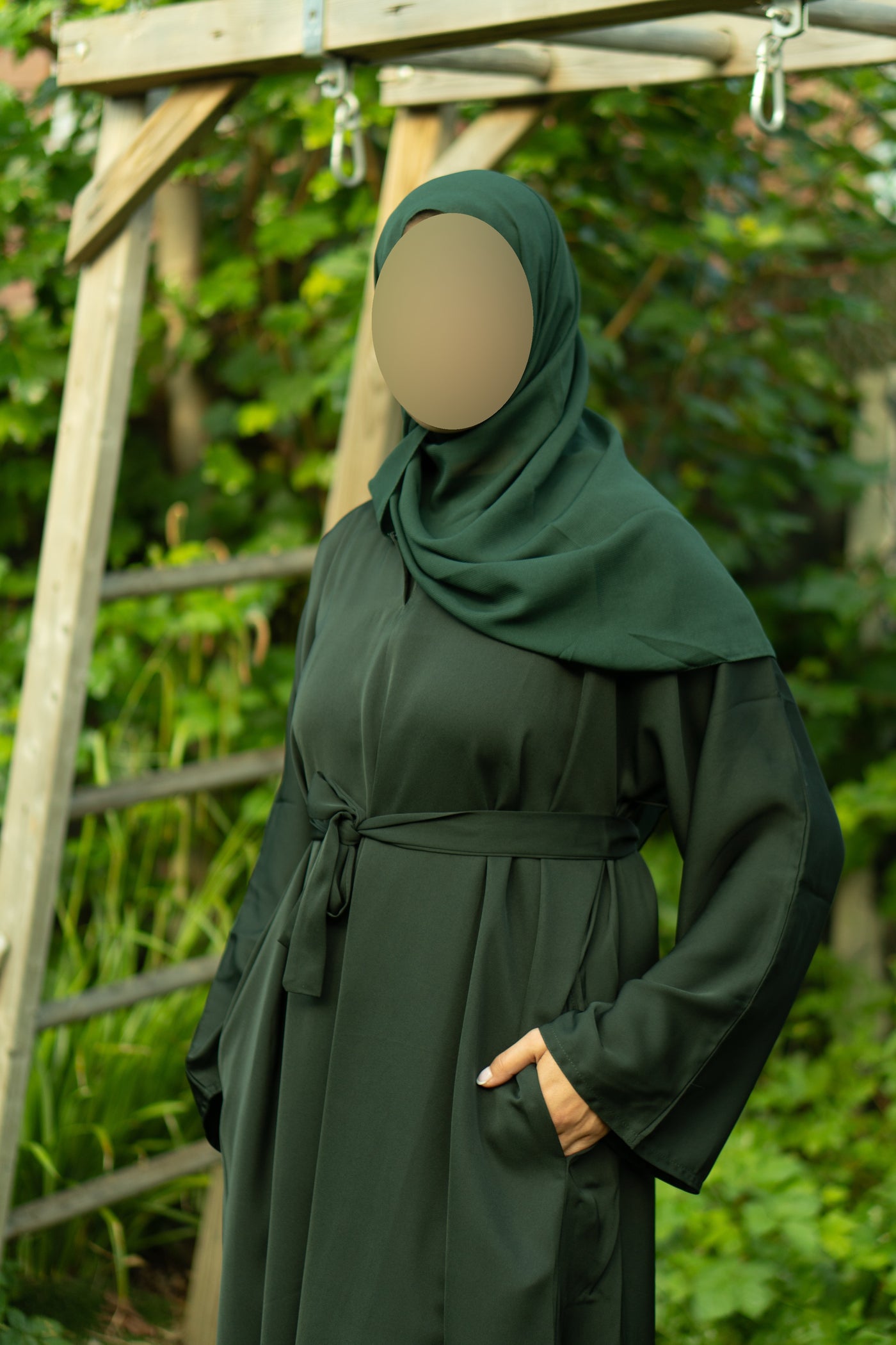 Closed green abaya