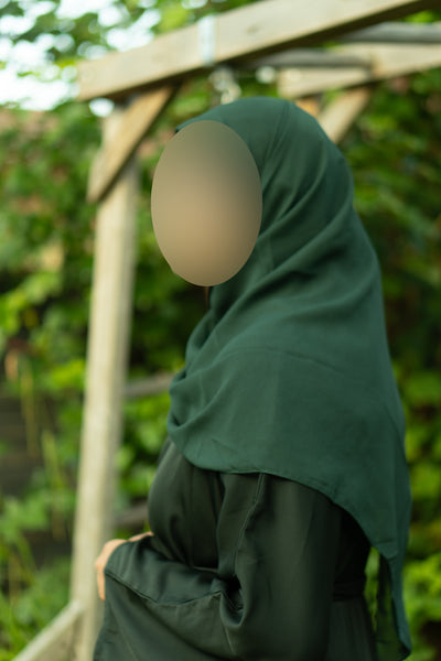 Closed green abaya