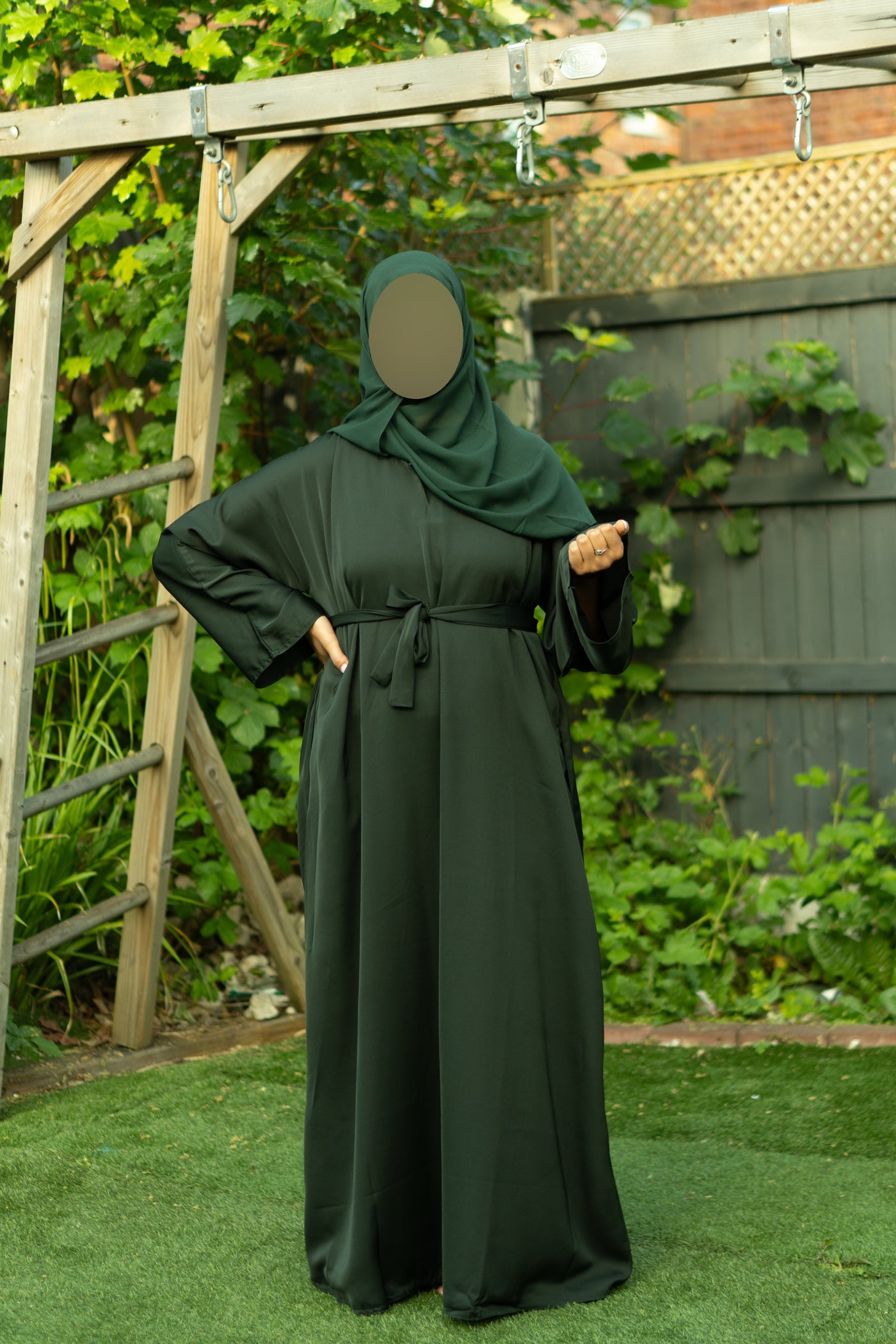 Closed green abaya